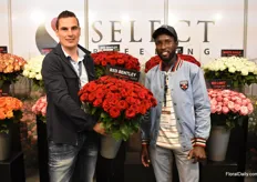 Micheal de Geus from Select Breeding together with his show greenhouse manager Kipkoech Hillary, holding the Red Bentley.